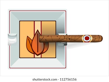 Smoking cigar in an ashtray. Isolated on a white background