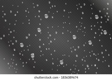 Smooth round strict drops on the glass. Raindrops on a transparent background. Moistened glass.