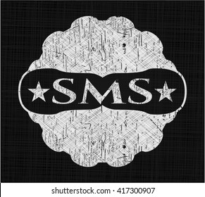 SMS chalkboard emblem on black board
