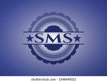 SMS emblem with jean background. Vector Illustration. Detailed.