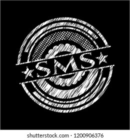 SMS written with chalkboard texture