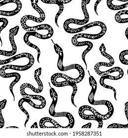 Snake pattern, black and white celestial serpent seamless pattern. Snake silhouettes in boho, mystical graphic style. Vector illustration bohemian ornament in linocut style. Mystic serpent background