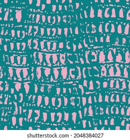 Snake skin seamless pattern. Pink spots on a turquoise background. Rich fashionable texture. Animal trendy pattern.