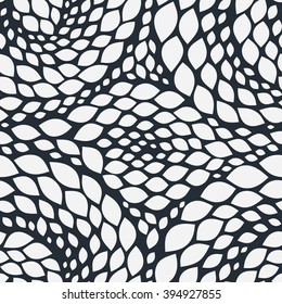 Snake skin texture. Seamless abstract pattern with colorful rhombuses. Vector illustration with abstract leaves.
