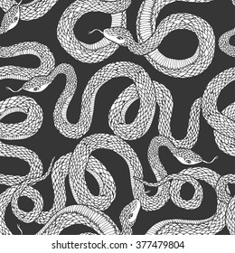 Snakes. Tattoo art, coloring books. Hand drawn vintage vector seamless pattern.