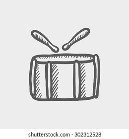 Snare drum with stick sketch icon for web and mobile. Hand drawn vector dark grey icon on light grey background.