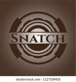 Snatch badge with wooden background