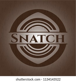 Snatch badge with wooden background