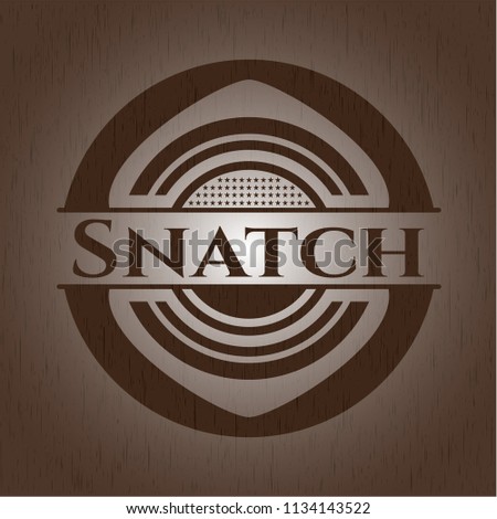 Snatch badge with wooden background