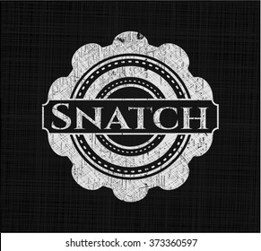Snatch chalk emblem written on a blackboard