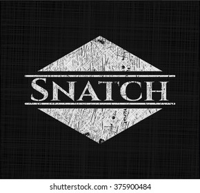 Snatch chalkboard emblem written on a blackboard