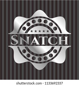 Snatch silvery emblem