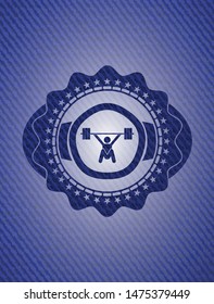 snatch, weightlifting icon inside badge with jean texture