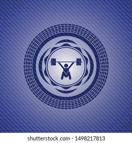 snatch, weightlifting icon inside badge with denim background
