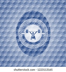 snatch, weightlifting icon inside blue emblem with geometric pattern.