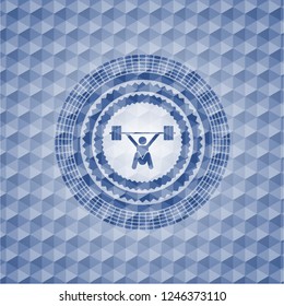 snatch, weightlifting icon inside blue badge with geometric pattern.