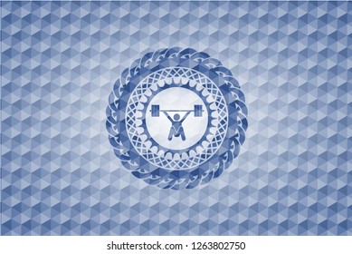 snatch, weightlifting icon inside blue badge with geometric pattern background.