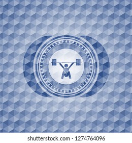 snatch, weightlifting icon inside blue badge with geometric pattern background.