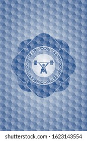 snatch, weightlifting icon inside blue badge with geometric background.