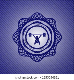 snatch, weightlifting icon inside denim background