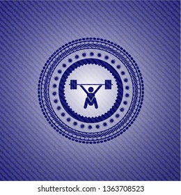 snatch, weightlifting icon inside denim background