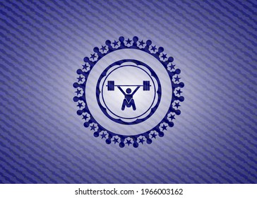 snatch, weightlifting icon inside emblem with denim texture. 