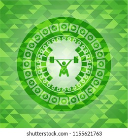 snatch, weightlifting icon inside green mosaic emblem