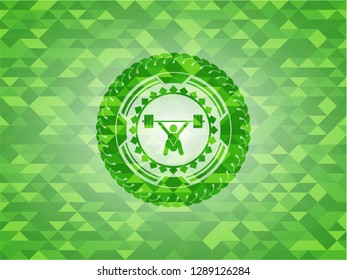 snatch, weightlifting icon inside green emblem. Mosaic background