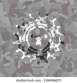 snatch, weightlifting icon inside grey camouflage emblem