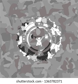 snatch, weightlifting icon inside grey camouflaged emblem