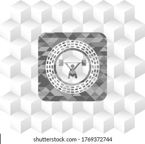 snatch, weightlifting icon inside grey emblem with geometric cube white background. 
