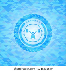 snatch, weightlifting icon inside light blue mosaic emblem