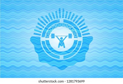 snatch, weightlifting icon inside light blue water wave badge.