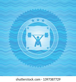 snatch, weightlifting icon inside light blue water badge.