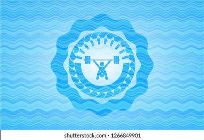 snatch, weightlifting icon inside sky blue water style emblem.