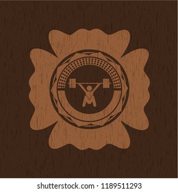 snatch, weightlifting icon inside vintage wood emblem