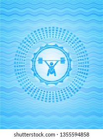 snatch, weightlifting icon inside water wave style emblem.