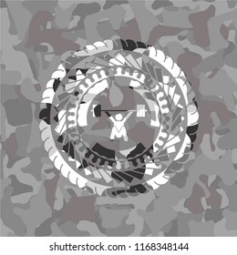 snatch, weightlifting icon on grey camouflage texture