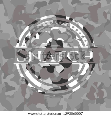 Snatch written on a grey camouflage texture