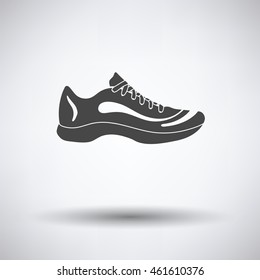 Sneaker icon on gray background with round shadow. Vector illustration.