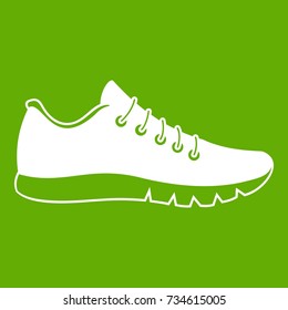 Sneakers icon white isolated on green background. Vector illustration