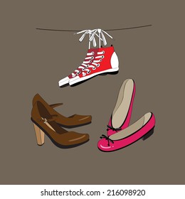 Sneakers, shoes and ballet Slippers on a brown background