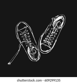 Sneakers. Vector hand drawn illustration. Sketch style. isolated on black