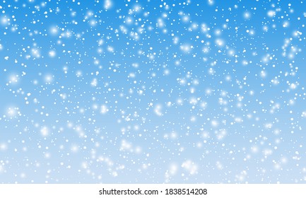 Fondo de nieve. Nevada de invierno. Los copos de nieve blancos en el cielo azul. Fondo de Navidad. Cae la nieve.