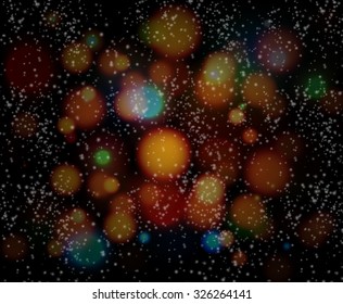 snow in the blurred background light garlands