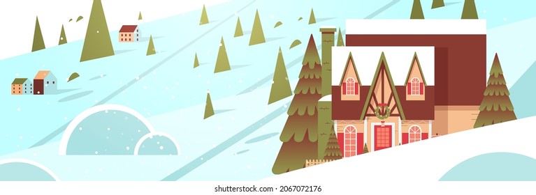 snow covered decorated house in winter season home building with decorations for new year and christmas celebration