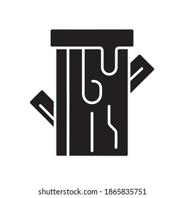 Snow covered wood trunk glyph icon