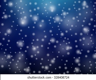 Snow falling on a winter night