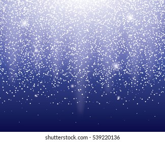 snow falling from the sky in the bright light.