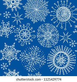 Snow flakes pattern. Doodle hand drawn snowflake icons background. Vector seamless Christmas and New Year gift wrapping paper design.